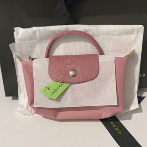 BNIB Petal Pink Longchamp pouch with handle